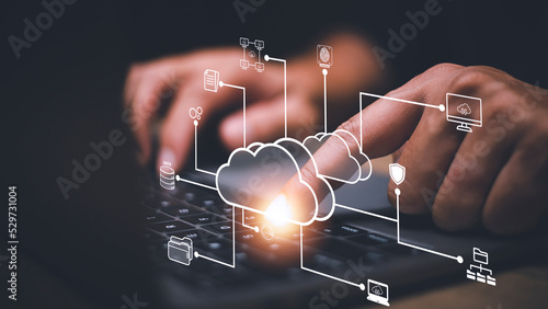 Businessman with cloud computing diagram show on hand. Cloud technology. Data storage. Networking and internet service concept.