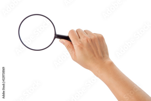 a hand holding a magnifying glass.