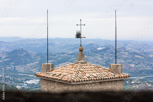 View of the foothills and another tower on Monte Titano and the state of San Marino capital from the Montale tower on a cliff over 800 meters high in an independent state in the heart of Italy