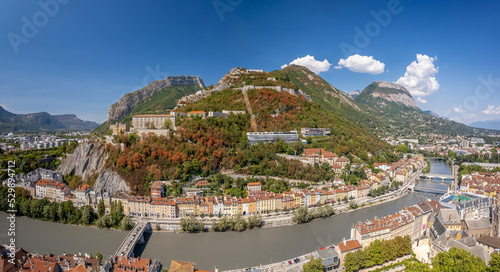 The drone aerial view of hill and fortress of the Bastille. The Bastille located at the south end of the Chartreuse mountain range and overlooking the city of Grenoble, France. 