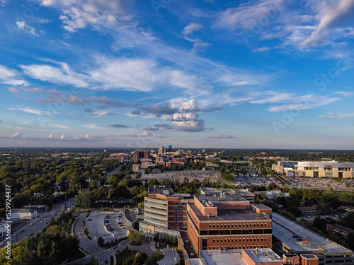 Distant drone view of Lexington, KY downtown district. Hospital building and University of Kentucky campus on the foreground.