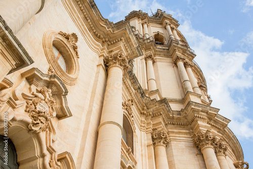 Closeup of the bell tower of the Duomo di San Giorgio, the mother church of the city of Modica in Sicily, Italy.