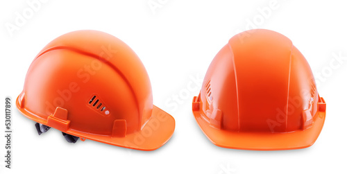 Orange plastic helmet on a white isolated background