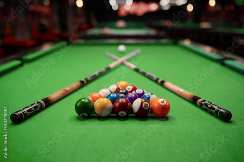 Billiard table with colorful ball