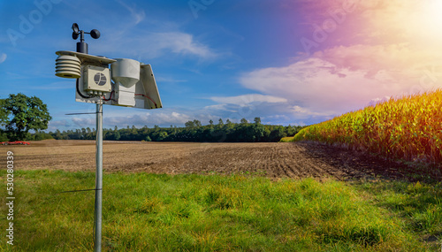 Modern and digital agriculture with a weather station when the weather is nice.