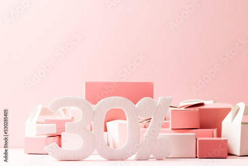 Composition of -30 percent text and boxes on white background