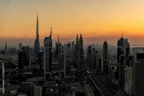 Aerial Dubai sunset cityscape of modern Skyscrapers UAE