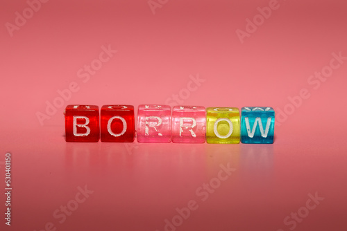 the word "borrow" made up of cubes