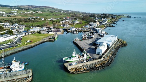 Bird's eye view of Greencastle Harbor with moored boats. Donegal, Ireland.