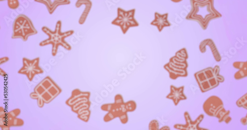 Image of gingerbread falling at christmas over blue background