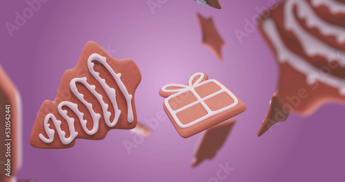 Image of gingerbread falling at christmas over purple background