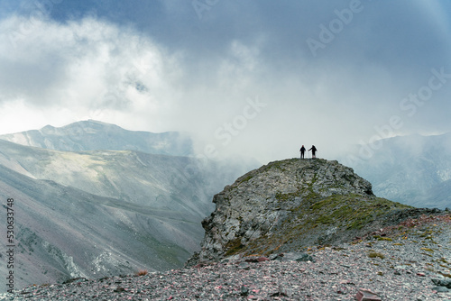 Two friends on a peak