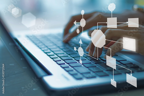 Business process and workflow automation with flowchart, businessman in background 