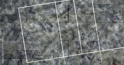 Composition of white sports court grid overhead view over black textured background