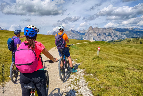 Cyclists on a trail in the Dolomites