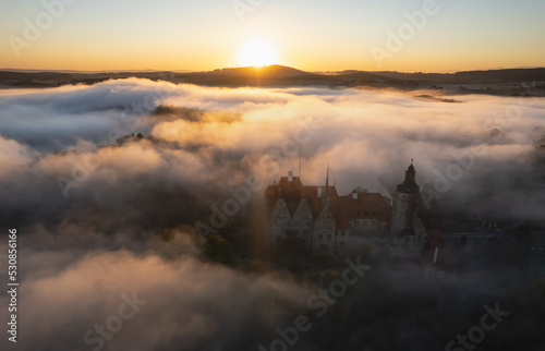 Czocha Castle in Lower Silesia on a foggy autumn morning,Poland