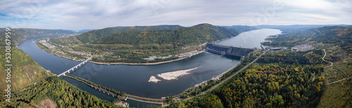View of the hydroelectric dam on the river, aerial shot