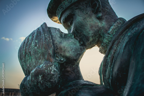 Bronze statue of a couple kissing in Civitavecchia (Rome) Italy