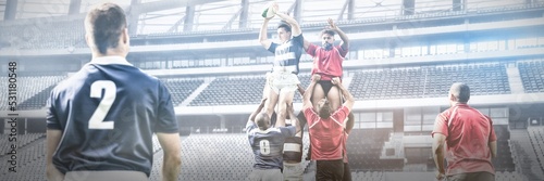 Digital composite image of team of rugby players jumping to catch the ball in a line out in sports s