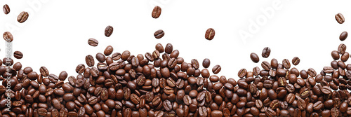 A pile of brown coffee beans, a lot of roasted beans lies and flies, isolated, on a white background