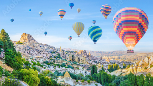 hot air balloons over Goreme town in Cappadocia Turkey
