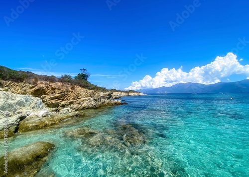 View from the path to the beautiful Saleccia beach (Plage de Saleccia) near Saint Florent. Beach with crystal clear sea water, Corsica, France.