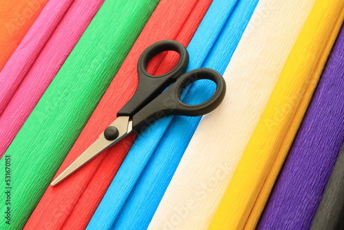 colorful crepe paper sheets and scissors