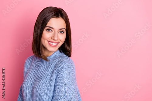 Closeup portrait of young smiling happy cute girl looking directly you recommend new dentistry isolated on pink color background
