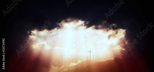 Light and ray of light shining through the sky and clouds on Golgotha Hill The background of the holy cross symbolizing the death and resurrection of Jesus