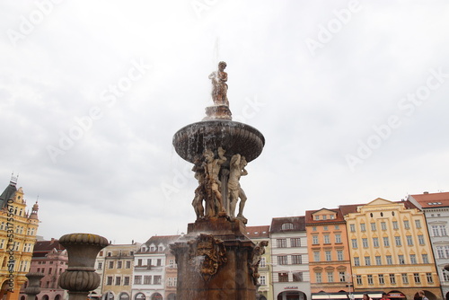 Fountain with gushing water at the square at Ceske Budejovice, Czech republic