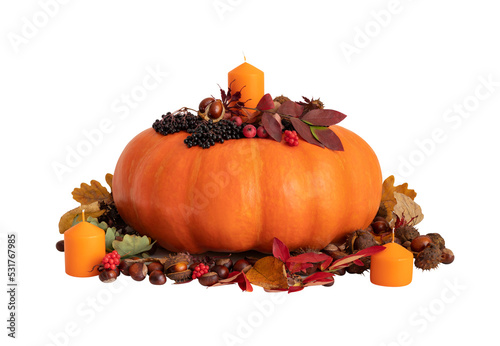 Festive pumpkin decoration isolated on a transparent background. Pumpkin with candles, dry leaves, chestnuts and berries. Thanksgiving day concept. Autumn decor.