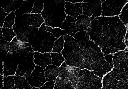 Texture of dry earth, white cracks on a black background. design element