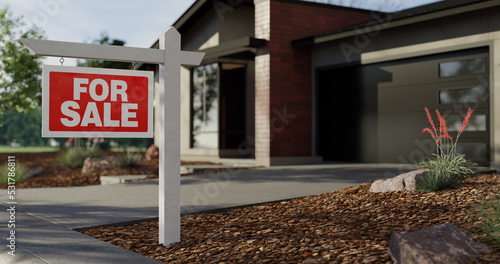 For sale sign in front of modern house.