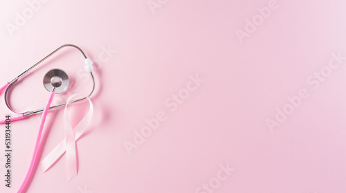 Pink ribbons and stethoscope on pastel background, Symbol of women's breast cancer awareness, Health care and medical concept.