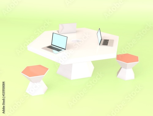 六角形のテーブルに置かれたノートパソコン