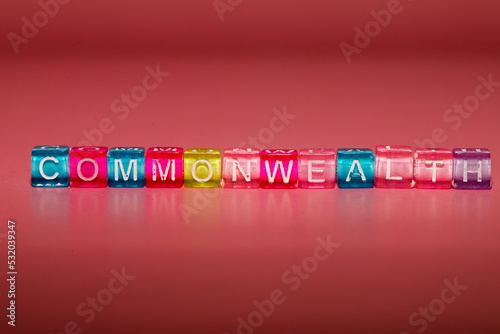 the word "commonwealth" made up of cubes