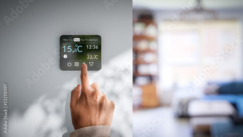 Setting room temperature on wall thermostat - Low winter temperatures in homes caused by the energy crisis in Europe