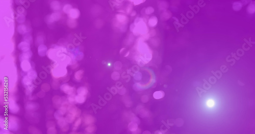 Image of light trails over blurred background