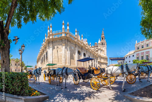 Views of Seville city, with Guadalquivir river and bridges, towers, streets and Squares in Spain.