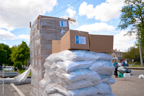 Humanitarian food aid unloaded in front of humanitarian centre