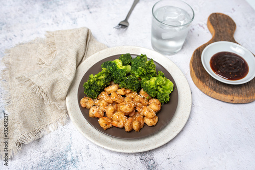 Shrimp and broccoli, low calorie high protein dish. Sesame seeds in teriyaki sauce. EASY SHRIMP AND BROCCOLI STIR FRY.