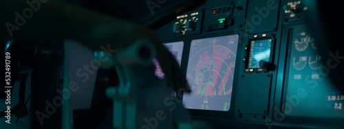 CU on airplane weather radar screen inside the cockpit, aircraft going through thunderstorm rain clouds, heavy turbulence