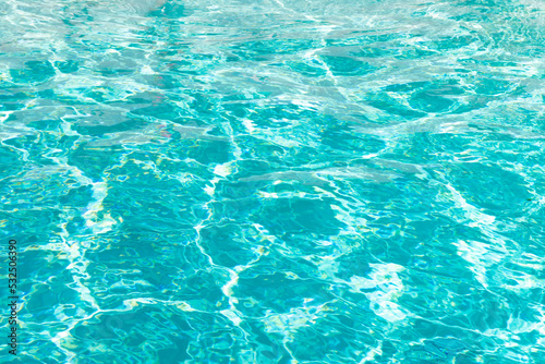blue color background of swimming pool water with ripples in miami