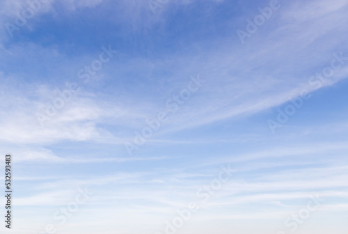 The vast sky and the white clouds float in the sky. The natural blue background has a breeze on a bright day in the summer.The sky and clouds are not the same shape as the weather.