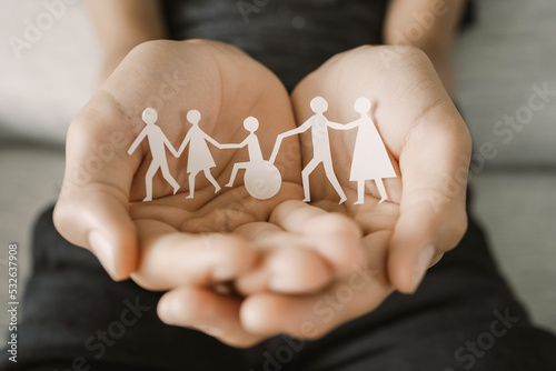 Hands holding diversity family, happpy carer and volunteer, disable nursing home, rehabilitation and health insurance concept