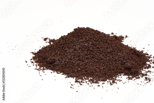 pile of coffee grounds isolated on white