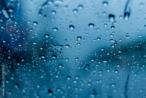 a window with water drops on the glass window after the rain.