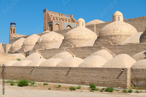 The domes of the ancient Anush Khan bath-health complex on a sunny day. Khiva, Uzbekistan