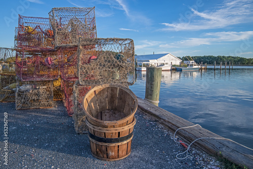 Crab pots and baskets along a Chesapeake Bay jetty.