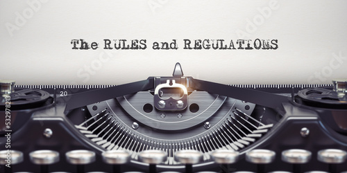 Rules and regulationswritten by typewriter. Typewriter and text on white sheet.